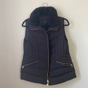 Black vest with fur collar